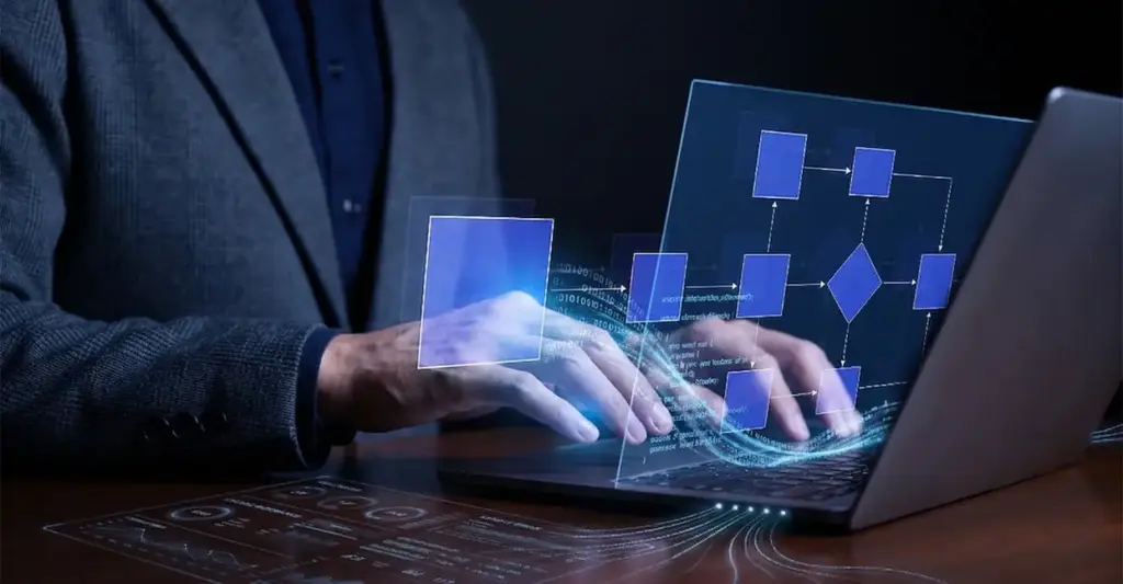 Person using laptop with digital workflow diagram representing system integration across business platforms.